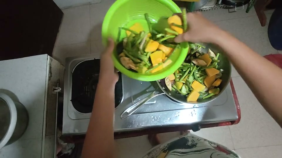 First-person view of hands preparing ingredients and cooking a stir-fry.
